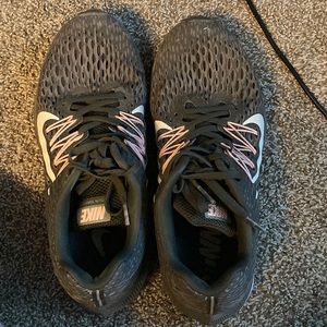 Grey, pink and white Nike shoes